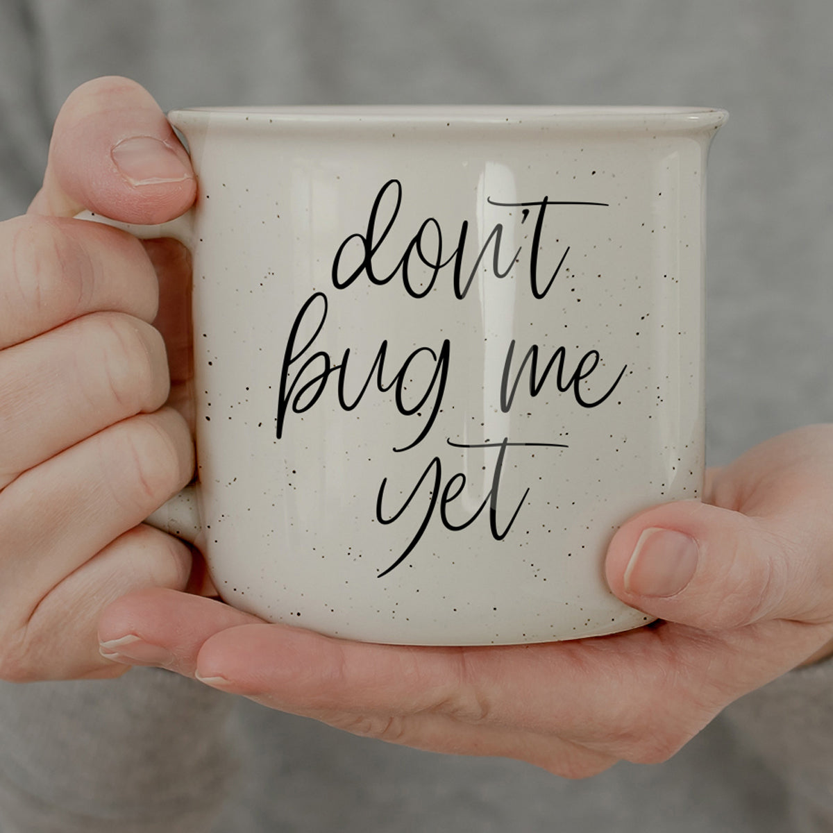 White ceramic coffee mug with dont bug me yet quote in modern calligraphy